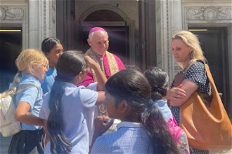 Children meet Bishop Paul
