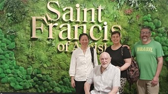 Columban team: Teresa Chuah, Nathalie Marytch, Mauricio Silva and Fr Ray Collier SSC at the exhibition