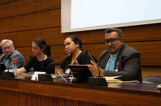 Rev James Bhagwan, speaking on implications of climate-induced displacement. Photo: Thomas Kleinveld / Franciscans International.