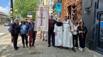 Processing through Camden. Image Dominicans