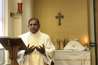 Fr Tanveer celebrating Mass at UK office of ACN
