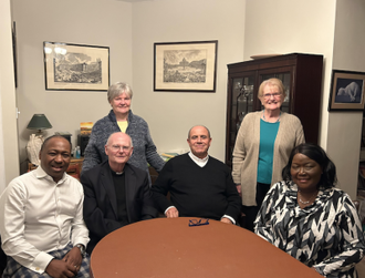 Fr Abusada (centre) and L-R: Larry Harrison, Fr John Deehan parish priest, Corrionne Naughton, Rose Haddow and Elizabeth Harrison