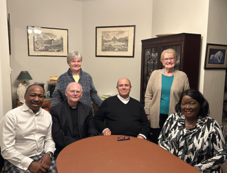 Fr Abusada (centre) and L-R: Larry Harrison, Fr John Deehan parish priest, Corrionne Naughton, Rose Haddow and  Elizabeth Harrison