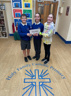 Three pupils involved with LiveSimply projects at Holy Family school