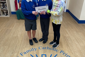 Three pupils involved with LiveSimply projects at Holy Family school