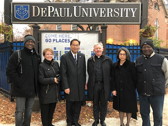 Fr Devine with Dr Gabriel Esteban, President of DePaul University, with faculty staff, after his lecture on conflict resolution and peace-building