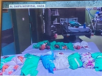 Screenshot: Babies moved from incubators and covered to keep warm after power was cut off