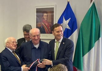 l-r: President Higgins with Fr Fr Des McGillicuddy and Chilean Ambassador  Ricardo Hernández