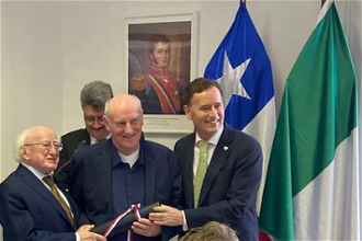 l-r: President Higgins with Fr Fr Des McGillicuddy and Chilean Ambassador  Ricardo Hernández