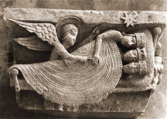 Autumn Cathedral, carving by Giselbertus, the angel shows the dreaming Magi the star