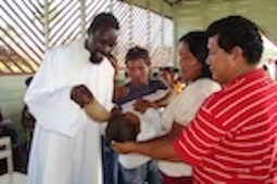 Fr Josiah at a recent baptism