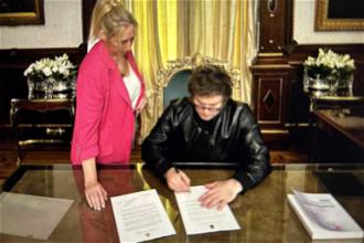 President Milei with his sister Karina, the Presidential Secretary,  signs letter to Pope Francis