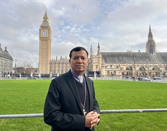 Archbishop Shaw outside Parliament © ACN