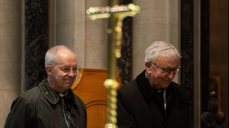 Archbishop Justin Welby, Cardinal Vincent Nichols walk together through Norwich