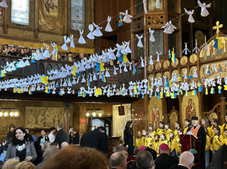 Bishop Nowakowski introduces St Mary's Ukrainian school choir during the service