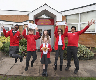 Evelyn (front, holding award) with Jayda, Oliver, Chloe Brady, Sophie and Nevil