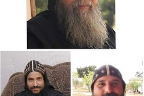 Father Takla Moussa, Father Minah Marcus, and Father Youstos Marcus