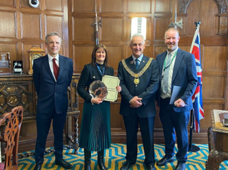 Estates Manager Andrew Muldoon, with headteacher Amanda Greaves, Mayor Alan Graves, and architect Ian Naylor