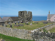 Graveyard and tower of St Mary's Abbey, Bardsey Island, Wiki Image by David Medcalf
