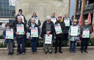 Campaigners under the statue of Lady Godiva