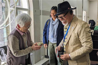 Toshiko Tanaka  and Tadayoshi Ogawa, during their visit to Friends House, Euston, 2 June 2024