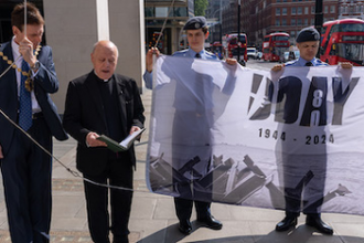 Fr Colven leads D-Day prayer