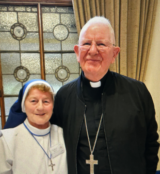 Sister Mary Brenda McCall with Bishop Michael Campbell OSA