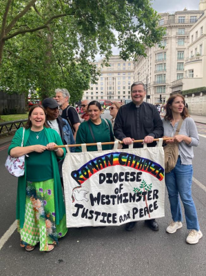 Colette Joyce and Fr Dominic Robinson  from Westminster J&P with campaigners about to join the  march.