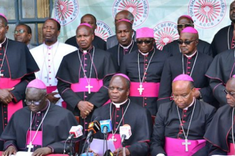 Some of Kenya's Bishops surrounding KCCB Chairman, Archbishop Maurice Muhatia Makumba