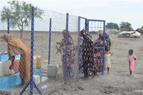 queueing for water. Image: CAFOD