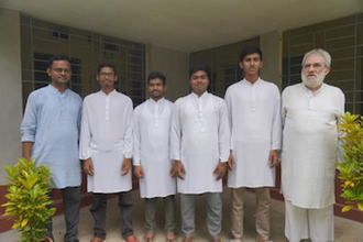 Jesuit priest with novices in Bangladesh © ACN