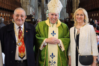 Cllr Marco and Maddalena Cereste with Bishop Peter Collins at the One Mass in Peterborough Cathedral. Image: Diocese of East Anglia