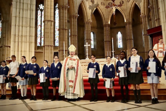 Some of the award recipients with Bishop Richard Moth at Arundel Cathedral