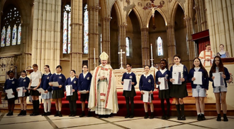 Some of the award recipients with Bishop Richard Moth at Arundel Cathedral