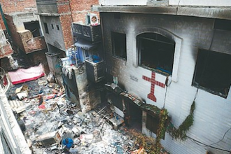 Burnt out church in Jaranwala © NCJP