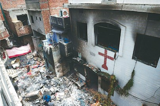 Burnt out church in Jaranwala © NCJP