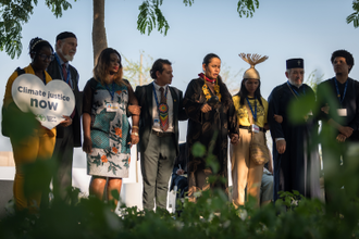 Interfaith prayers at COP28 in Dubai last year: Shirley Krenak of the Krenak indigenous people in Brazil. Photo: LWF/Albin Hillert