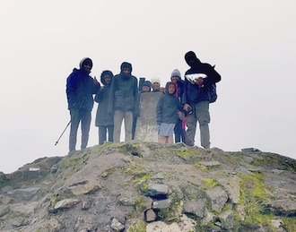 Do Rozario and Pampackal families on top of Ben Nevis © Aloma Pampackal