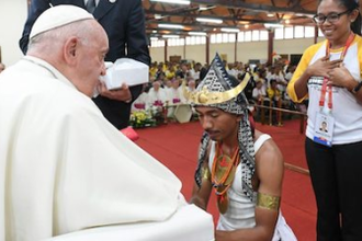 Pope meets young East Timorese man