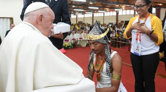 Pope meets young East Timorese man