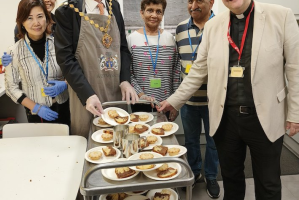 Mayor Robert Rigby, Fr Dominic Robinson with  volunteers