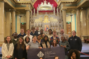 Young pilgrims in the St Vincent de Paul chapel, Paris