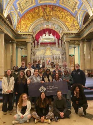 Young pilgrims in the St Vincent de Paul chapel, Paris