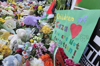 Toys and flowers left at gates of Downing Street