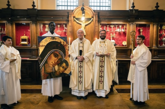 Cardinal with presbyter and three Redemptorist Mater House seminarians