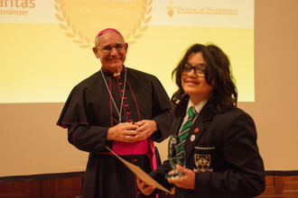 Bishop Paul McAleenan with Kai Shah  - Young Volunteer of the Year  Image Caritas Westminster.