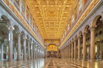 Interior of St Paul Outside the Walls, highlighting the 'Medallions of the Popes' © Alamy