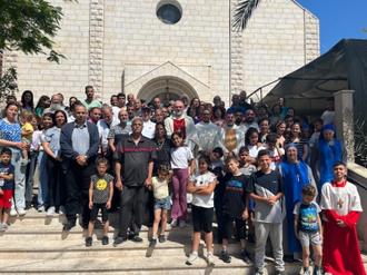 Cardinal Pierbattista with parishioners at Holy Family Parish Gaza, during his May visit