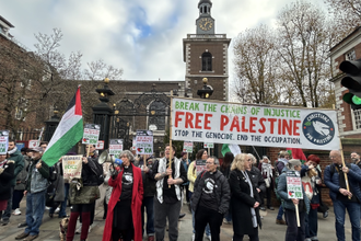 Pictured: Rev Helen Burnett Vicar Chaldon Church, Surrey, on megaphone, Rev Mo Budd  curate at St Mary the Blessed Virgin,  Addington, Rev Grey Collier, St John's Waterloo outside St James.