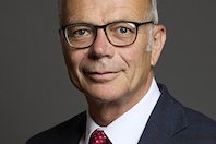 Dr Simon Opher MBE MP